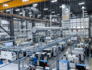 Wide view of Dynamic Source Manufacturing Inc.'s advanced electronics manufacturing facility in Calgary, featuring automated production equipment, assembly lines, and manufacturing operations supporting complex electronic products.